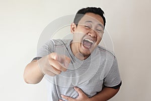 Man laughing Hard Bully Expression and Pointing Forward