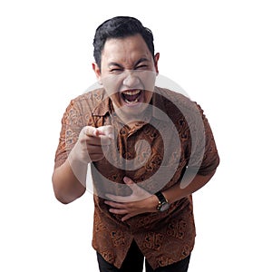Man laughing Hard Bully Expression and Pointing Forward photo