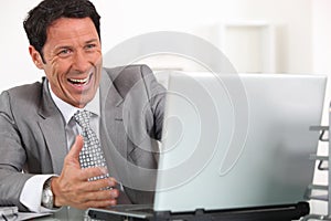 Man laughing hysterically