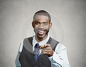Man laughing pointing finger at someone