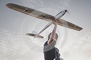 Man launches RC glider into the sky