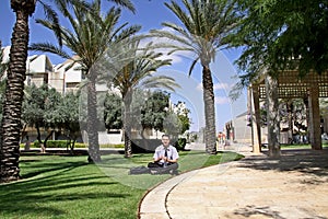 Man on the lawn in Ben Gurion University campus