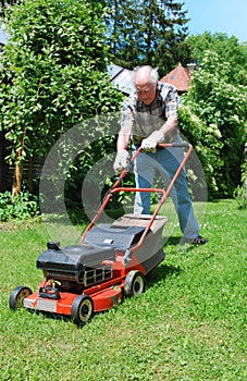 Man with lawn mower