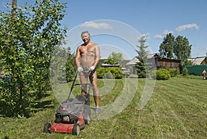 Man with the lawn mower