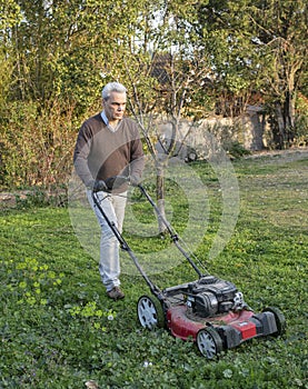 Man with lawnmower