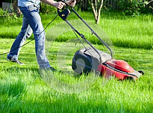 Man with lawnmower