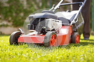 Man with lawnmower