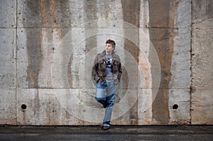 Man Leaning Against Wall