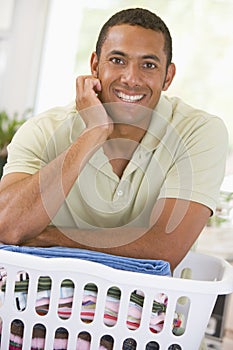 Man Leaning On Laundry