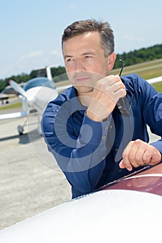 Man leant on aircraft