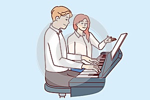Man learns to play piano with woman teacher who tutors and gives private lessons