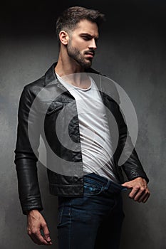 man in leather jacket showing how thin he is