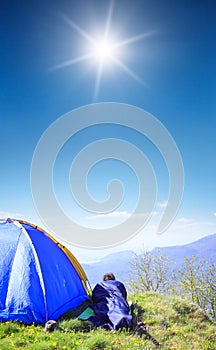 Man lie in sleeping bag