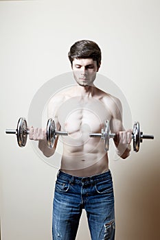 Man lifting dumbbell