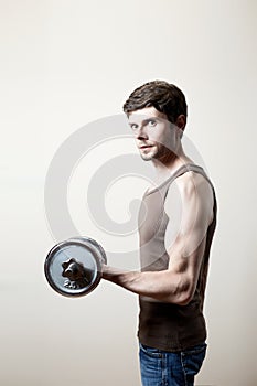 Man lifting dumbbell