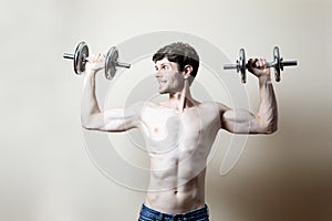 Man lifting dumbbell