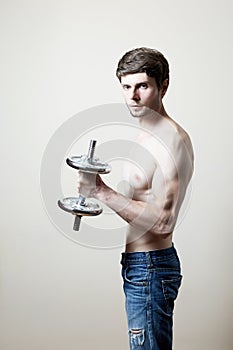 Man lifting dumbbell