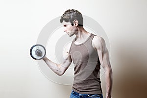 Man lifting dumbbell