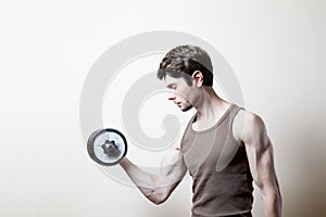 Man lifting dumbbell