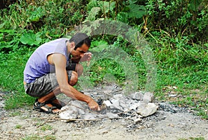 Man lighting fire
