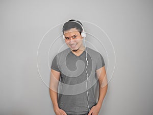 Man listen to music with headphone.