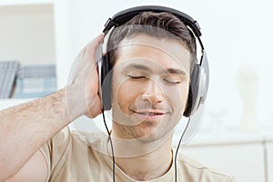 Man listening music with headphones