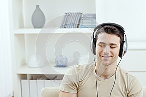 Man listening music with headphones