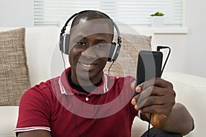 Man Listening Music On Headphones