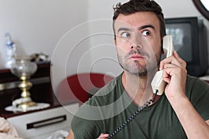 Man listening to gossip with attention