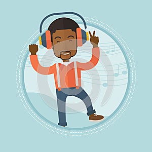 Man listening to music in headphones and dancing.