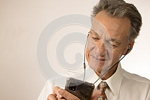 Man listening to music on his smartphone