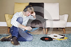 Man Listening To Records In Living Room