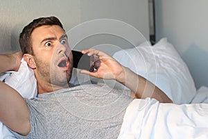 Man listening to rumours on the phone