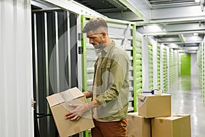 Man Loading Storage Unit