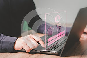 Man login with fingerprint scanning technology in the computer. Cyber security concept to protect data