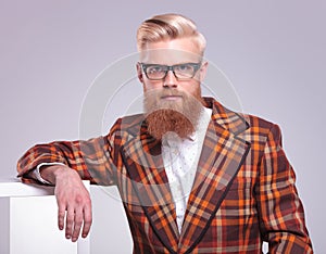 man with long red beard and glasses resting