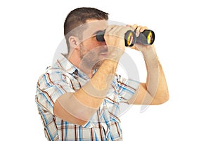 Man looking through binocular