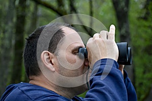 Man Looking Through Binoculars - Sightseeing