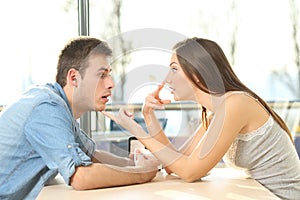 Man looking at bosom of a girl in a date photo