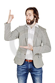 man looking at camera and pointing finger up. image isolated over white background. people, male, business and portrait concept