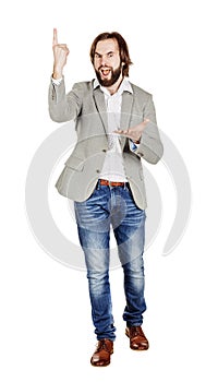 man looking at camera and pointing finger up. image isolated over white background. people, male, business and portrait concept