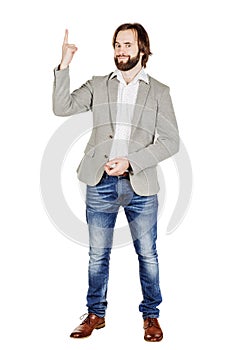 man looking at camera and pointing finger up. image isolated over white background. people, male, business and portrait concept