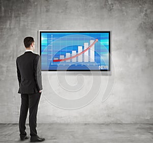 Man looking at chart