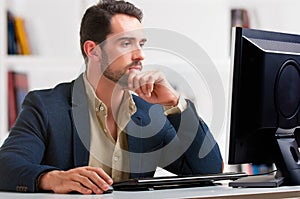 Man Looking At A Computer Monitor