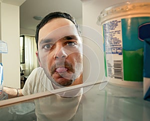 Man looking into the fridge