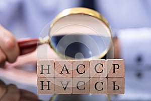 Man Looking At HACCP Letters