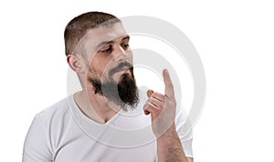 Man looking at his index finger on white background