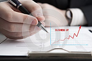 Man is looking for information in the in the budget figures