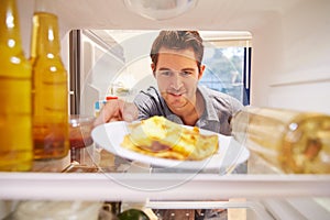 Man Looking Inside Fridge Full Of Unhealthy FoodÃ¯Â¿Â½