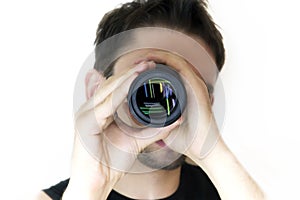 Man looking in an objective